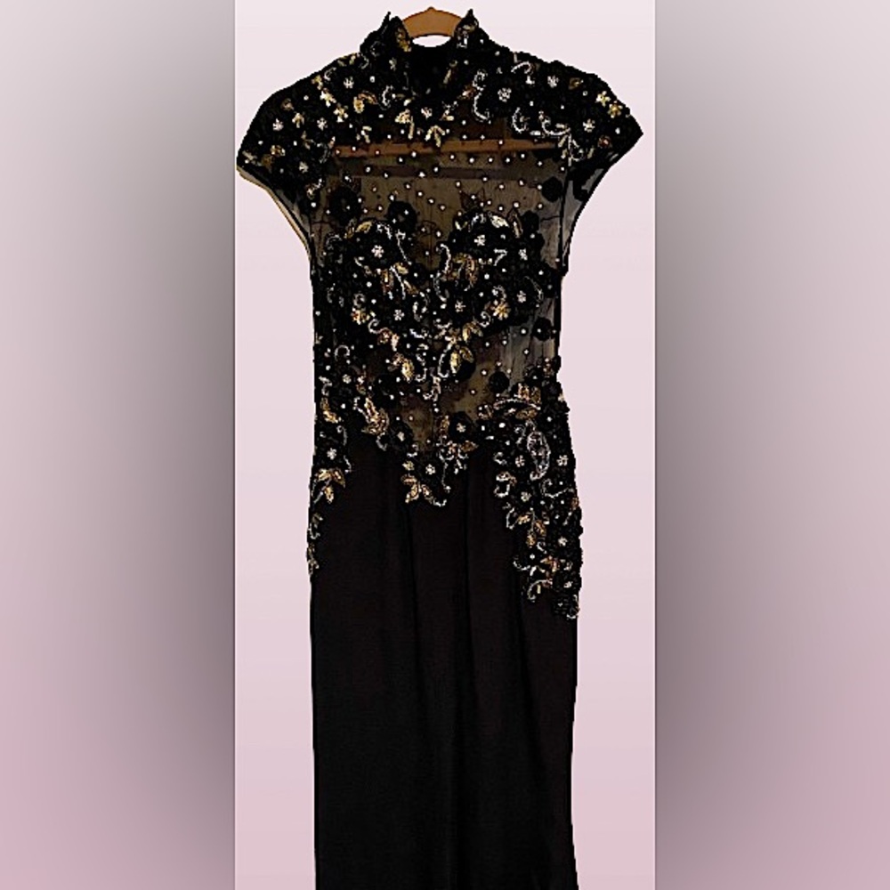 Elegant Black Dress with Gold Embellishments
